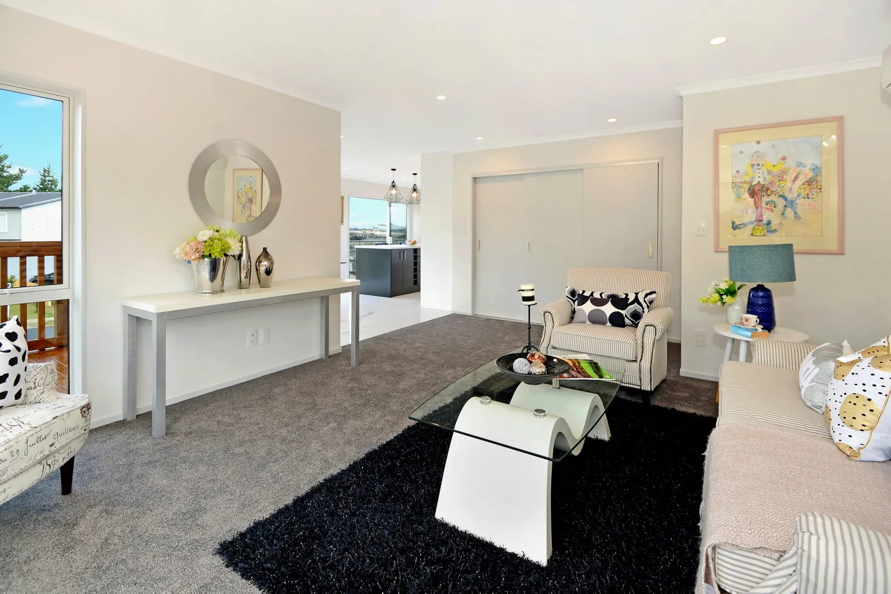 Spacious open-plan living interior in new home by JHJ Homes